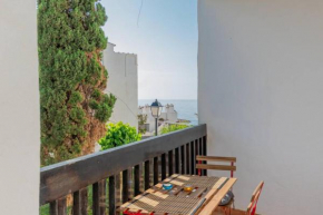 Beachfront 1BR with swimming pool, parking & AC